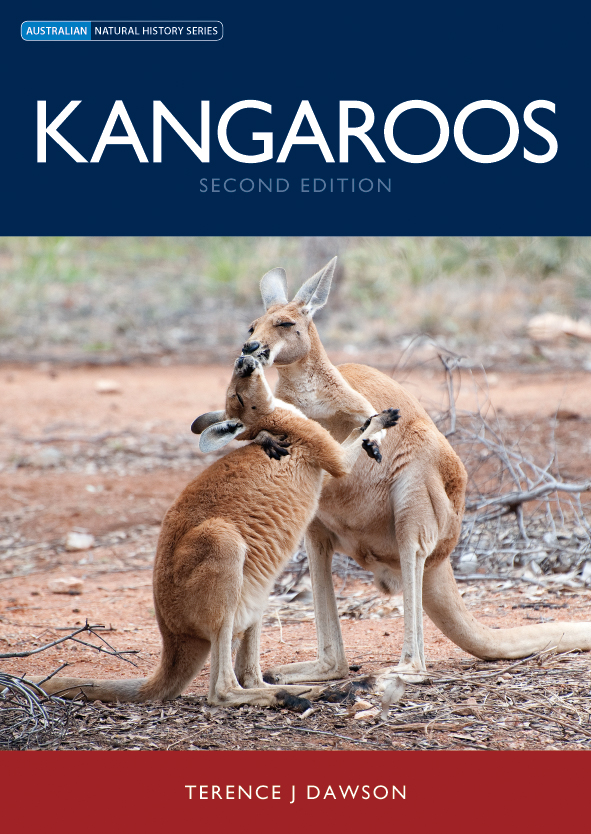 The cover image features two red and beige kangaroos that look as though they are kissing, with a backdrop of dusty red dirt, grey bracken and grass.
