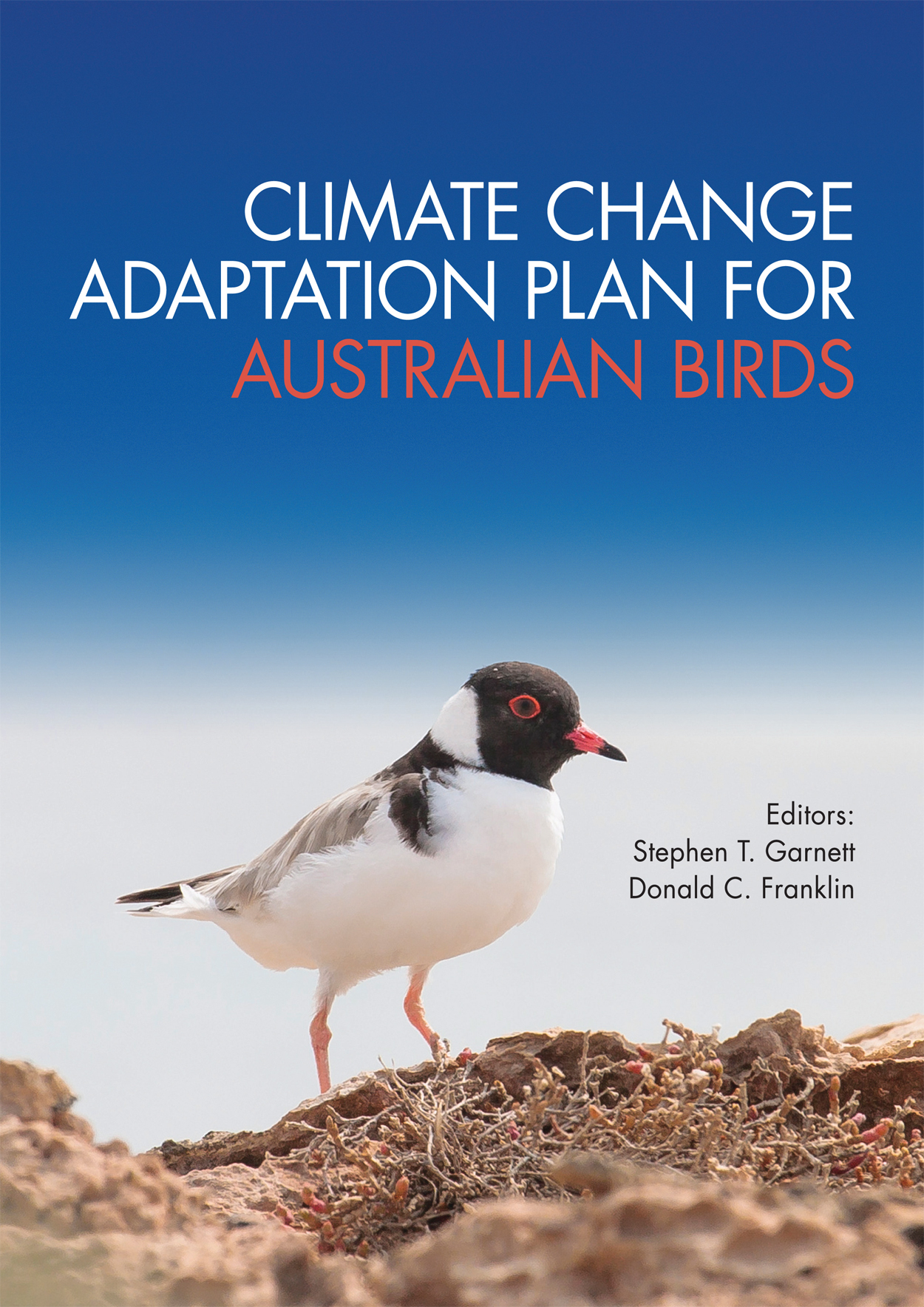 Cover image featuring a white bodied bird with a black head and a bright red eye and beak standing on beige dirt with bright blue and white sky backgr