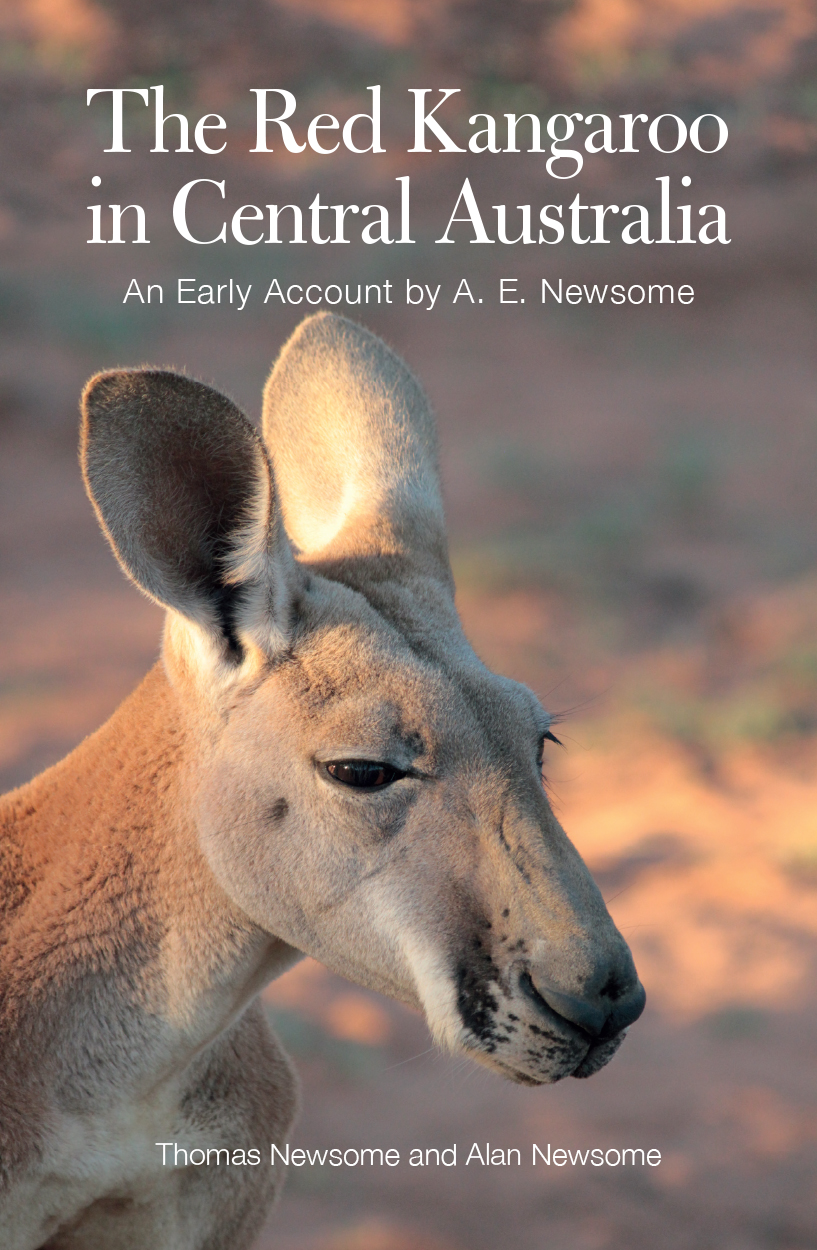 Cover image featuring a close-up photograph of the face of a red kangaroo in the light of sunset.