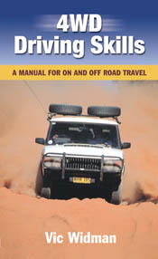 The cover image featuring a white 4WD driving directly at the photograph t