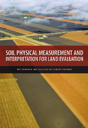 The cover image featuring an arial view of long yellow and brown fields.