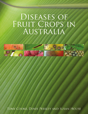 The cover image of Diseases of Fruit Crops in Australia, featuring eight thin strip images of diseased tropical fruit and their leaves set into a plai