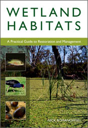The cover image of Wetland Habitats, featuring a body of water covered in
