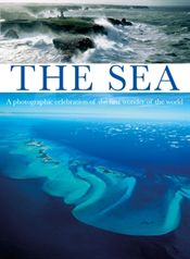 Cover has two sea images one bright blue, the other close up of crashing w