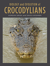Cover image of Biology and Evolution of Crocodylians, featuring the head o