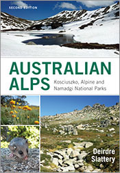 Cover featuring images of snow-covered alps with a lake, flowers, a mounta