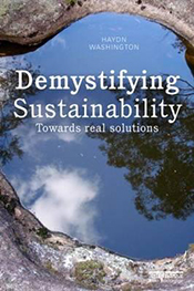 Cover image is of a dark waterhole reflecting the sky and a tree.