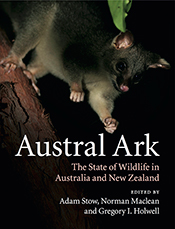 Cover is a possum on a branch against a plain black background.