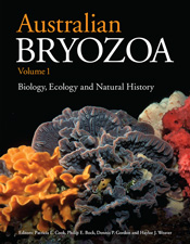 Cover featuring orange, grey and red Celleporaria colonies on a black back