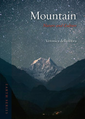 A night-time image of a very large Himalayan, snow-capped mountain, rising