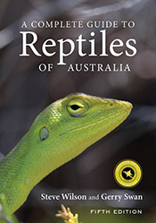 Cover features a green lizard head on a dark background