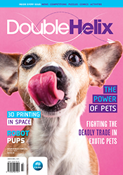 Magazine cover with a small dog licking its nose.