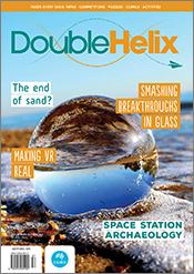 Cover of 'Double Helix' magazine issue 57, featuring a photograph of a glass sphere on a sandy beach.