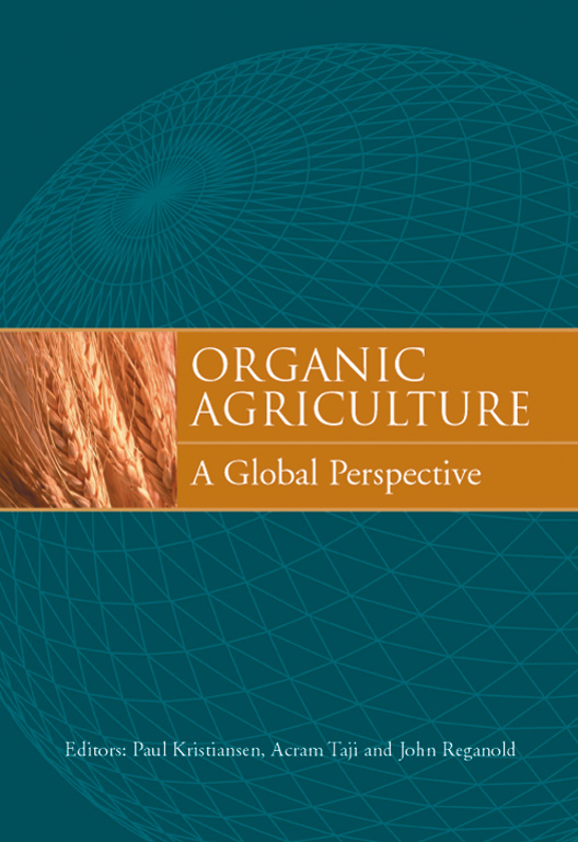 The cover image of Organic Agriculture, featuring a globe in shades of green covered in a triangular pattern, with a gold strip across the middle of t