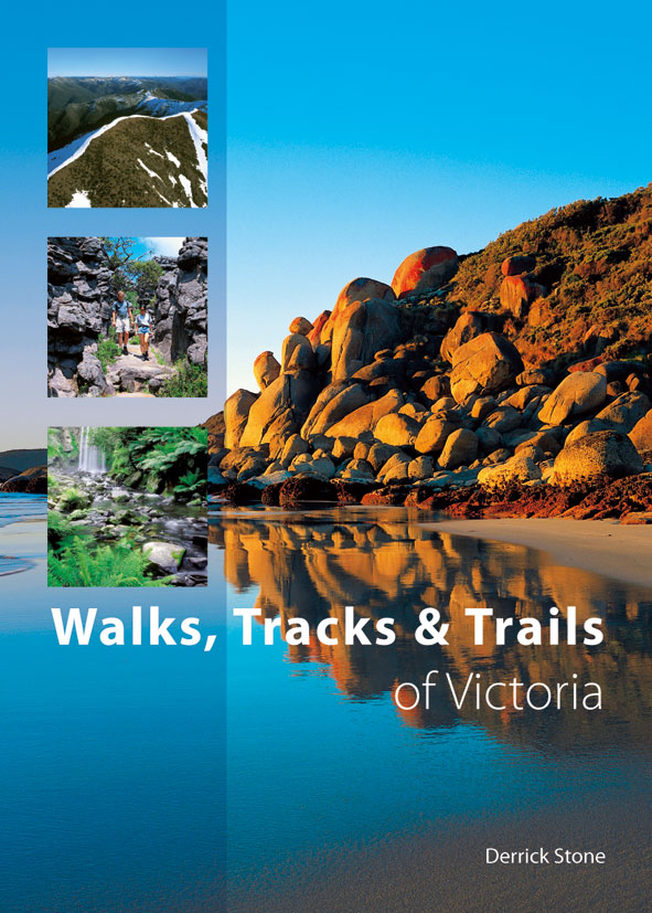 The cover image featuring a rocky beach embankment reflected in bright blue water, with a bright blue sky.