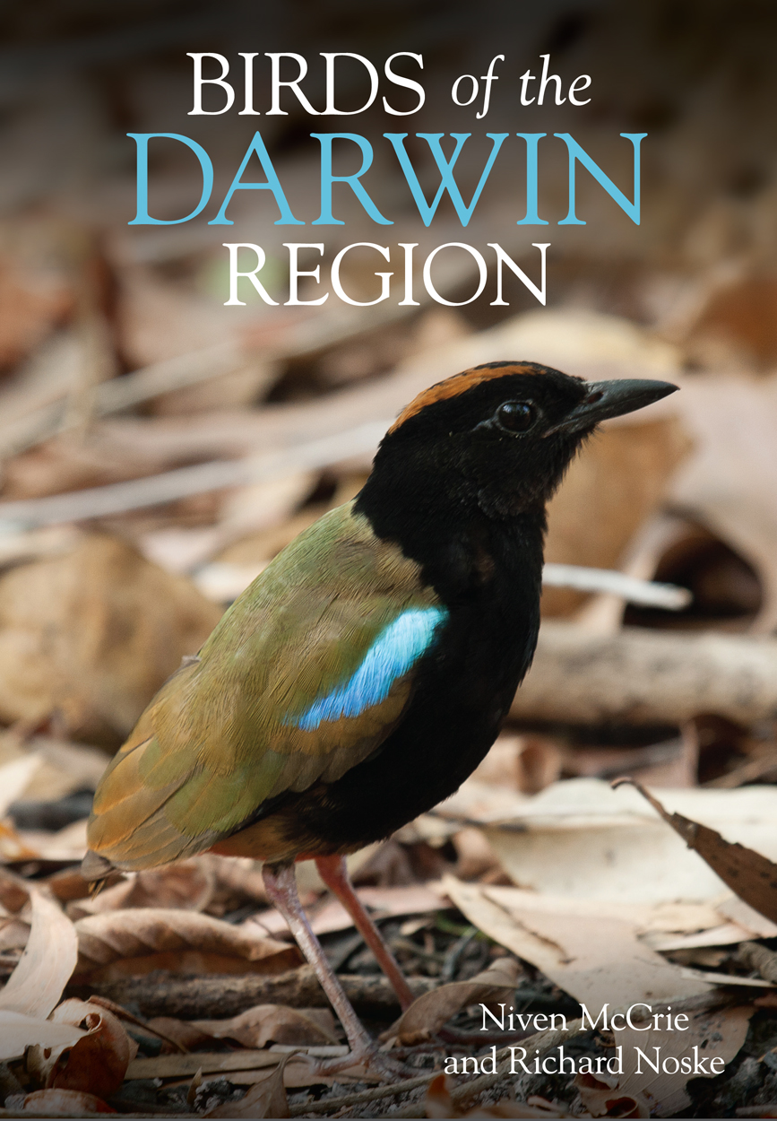 Cover image featuring a Rainbow Pitta standing on the ground surrounded by leaves.