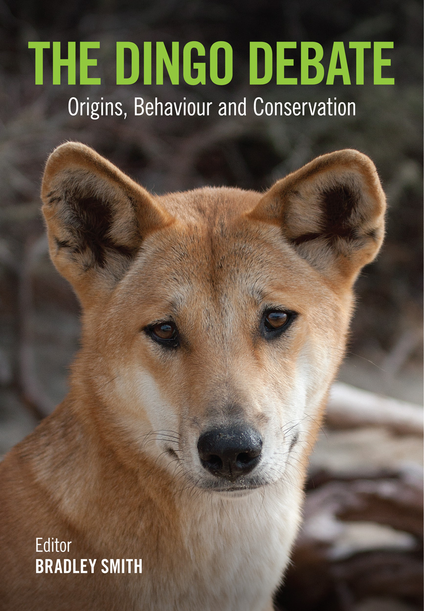Cover image of The Dingo Debate, featuring a close-up photograph of a dingo