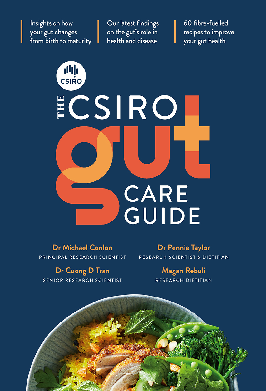 Cover of The CSIRO Gut Care Guide, showing the title in white and orange font on a dark blue background, above a bowl of chicken and spiced rice with