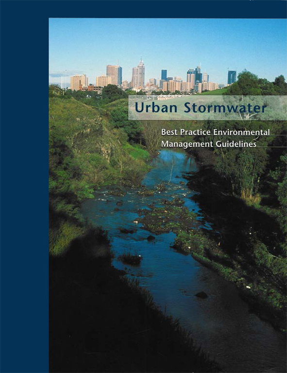 The cover image of Urban Stormwater, featuring a storm water creek and embankment, with a city skyline in the background, with blue skies.