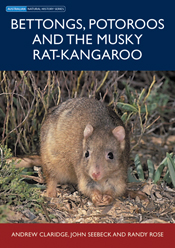 The cover image featuring a musky rat-kangaroo in bracken with shrubs bases in the background.