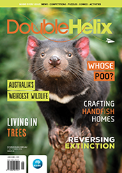 Magazine cover with Tasmanian Devil against green background.