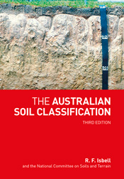 Cover of The Australian Soil Classification, Third Edition, featuring a photo of a soil profile with measuring tape in the top half of the cover. The