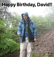 Photograph of David Craik on a field trip, navigating the team through the mist.